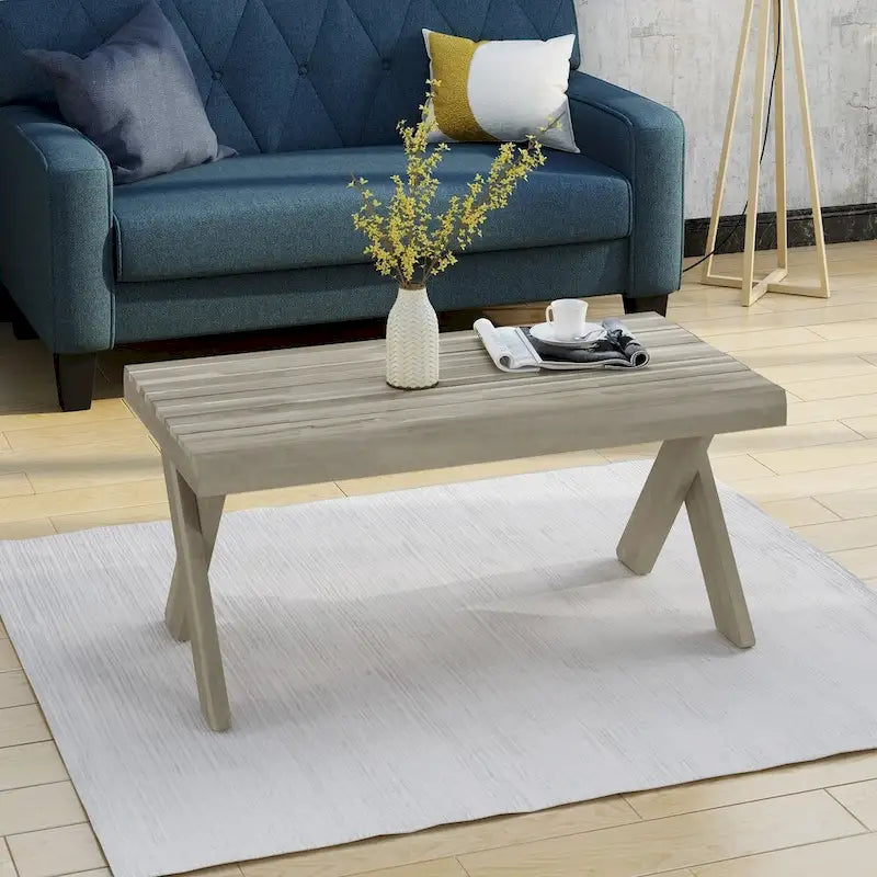 Couchtisch im Landhausstil aus Akazienholz mit Kreuzgestell