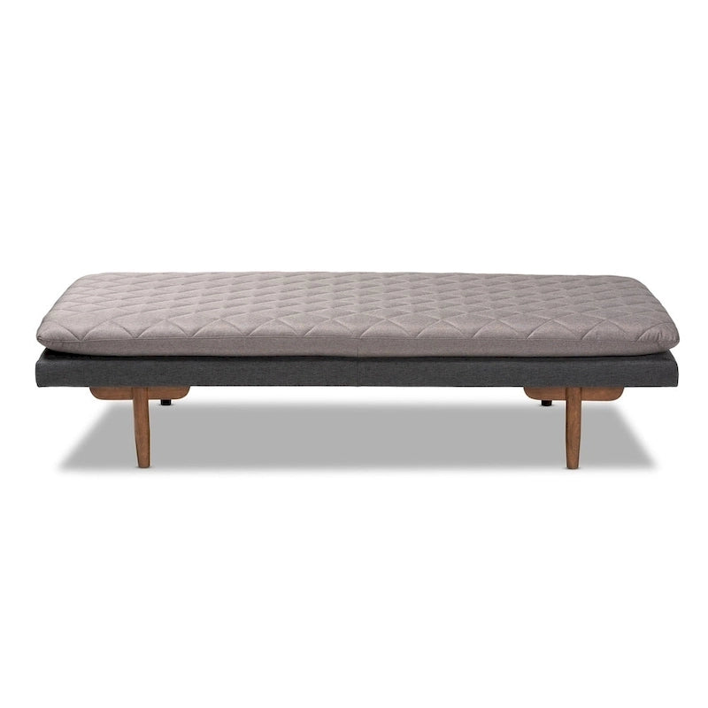 Tapicerowane łóżko dzienne w stylu mid-century modern z pikowaną tkaniną i drewnianymi nogami