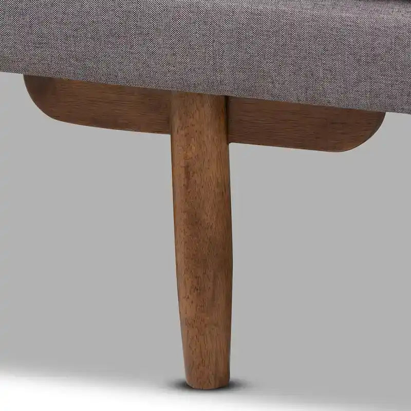 Tapicerowane łóżko dzienne w stylu mid-century modern z pikowaną tkaniną i drewnianymi nogami